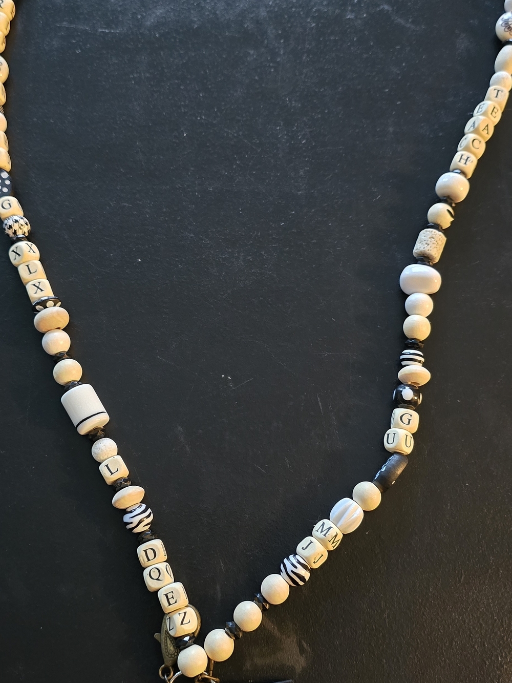 Plunder Cream and Black Beaded Letter Necklace